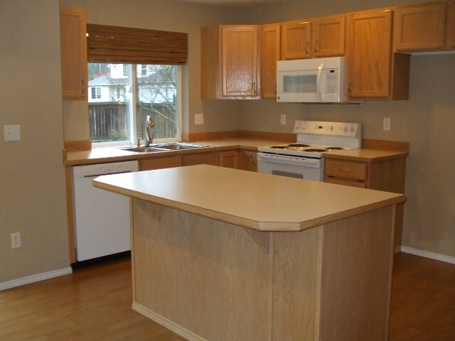 Property Photo: 10409 Springwood Dr E WA 98391