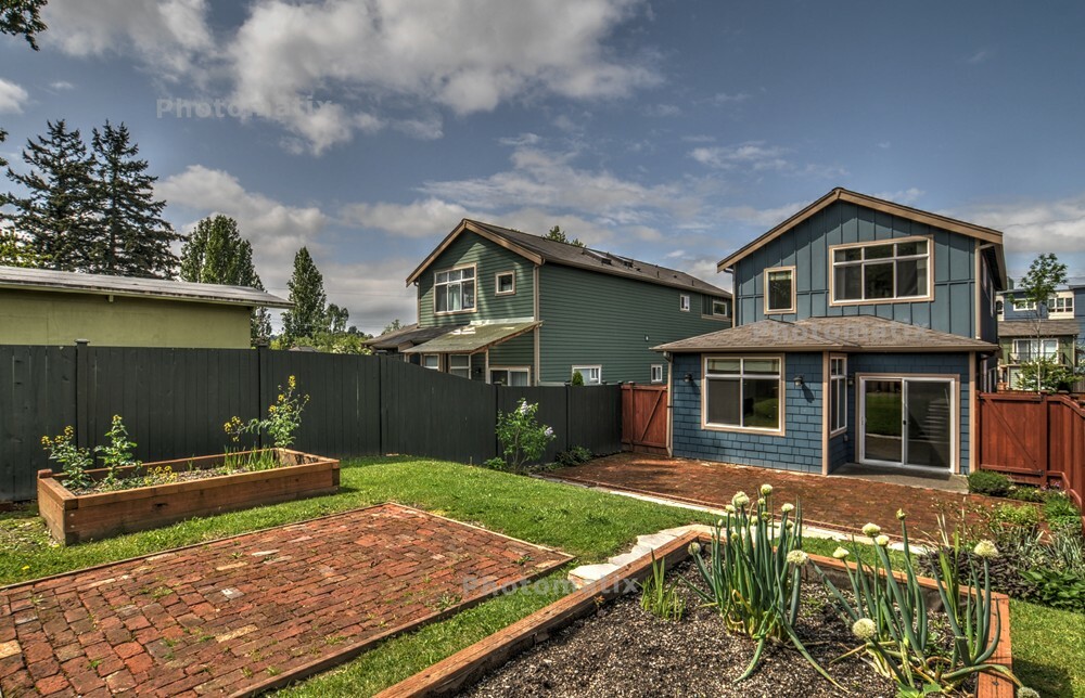 Property Photo:  8132 Wolcott Ave S  WA 98118 