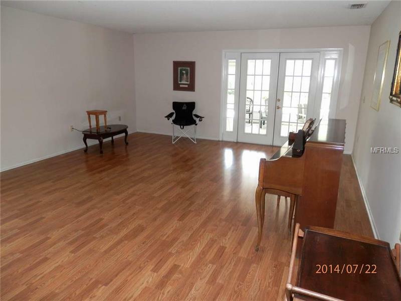 Property Photo:  5104 The Oaks Circle  FL 32809 