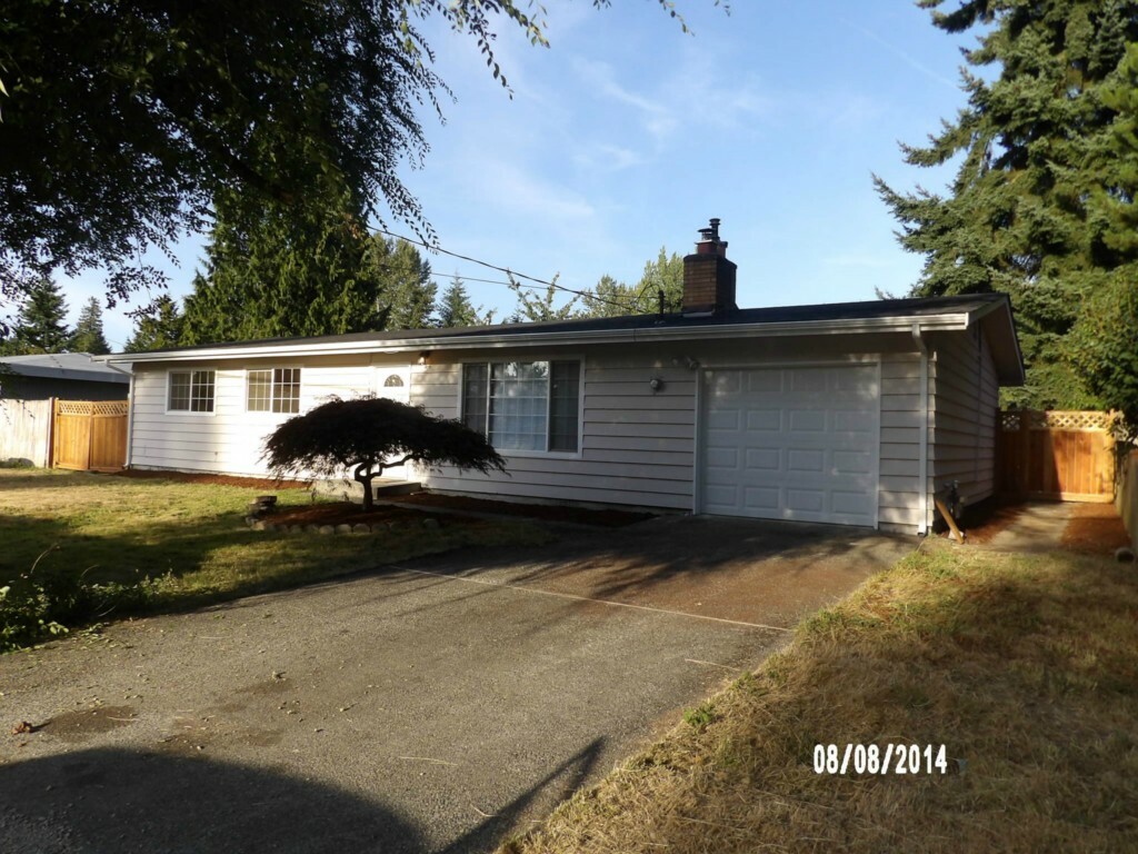 Property Photo:  20228 4th Ave S  WA 98198 