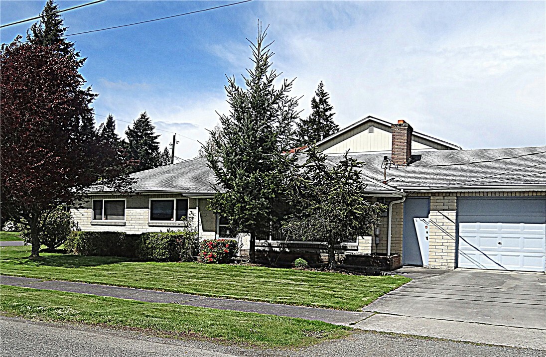 Property Photo:  415 S 94th St  WA 98444 