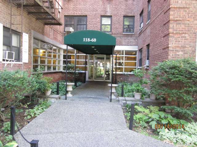 Property Photo: 118-60 Metropolitan Ave 1C NY 11415