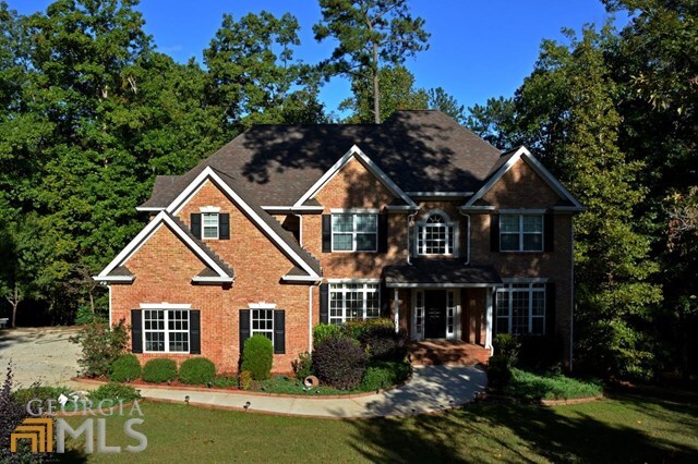 Property Photo: 7408 Cypress Trace GA 30187