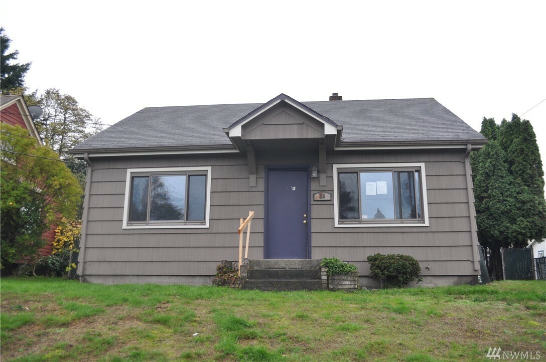 Property Photo:  116 E 45th St  WA 98404 