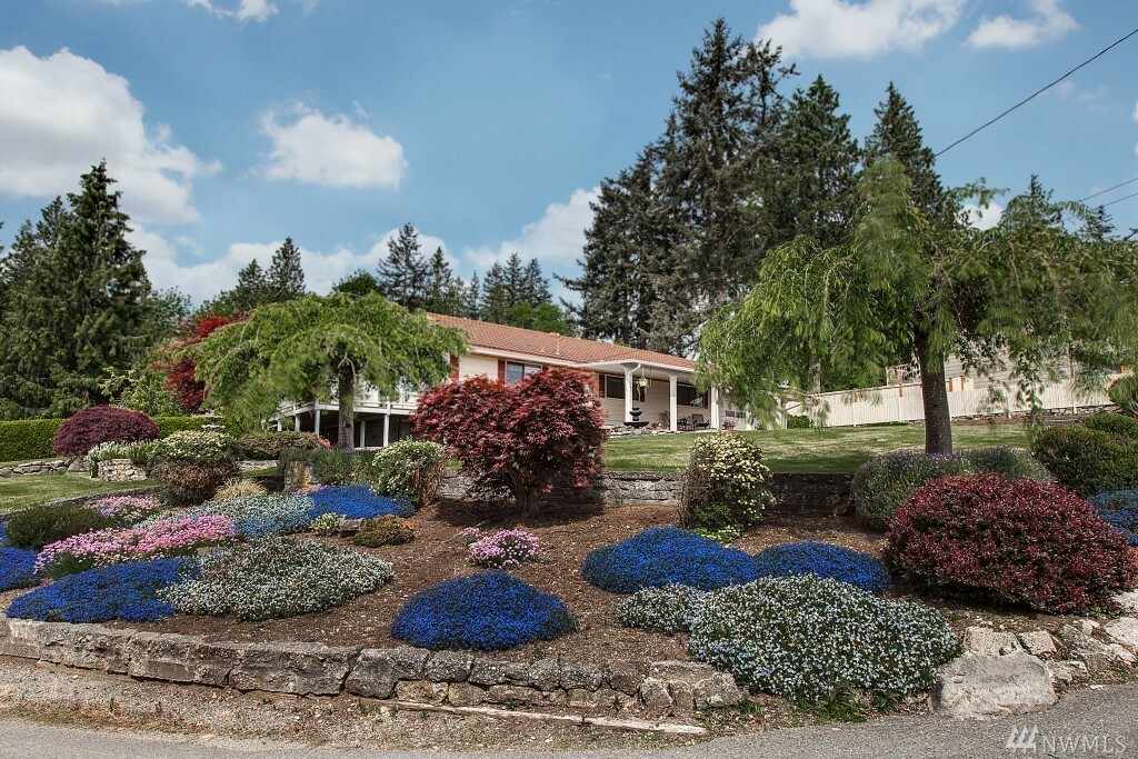 Property Photo: 11328 E Ibberson Dr WA 98208