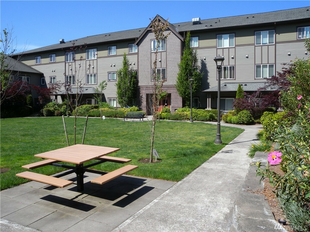 Property Photo:  973 NE Ingram St A203  WA 98029 