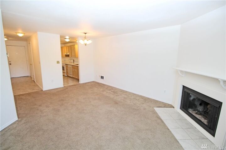 Property Photo:  19764  3rd Avenue NW D-46  WA 98370 