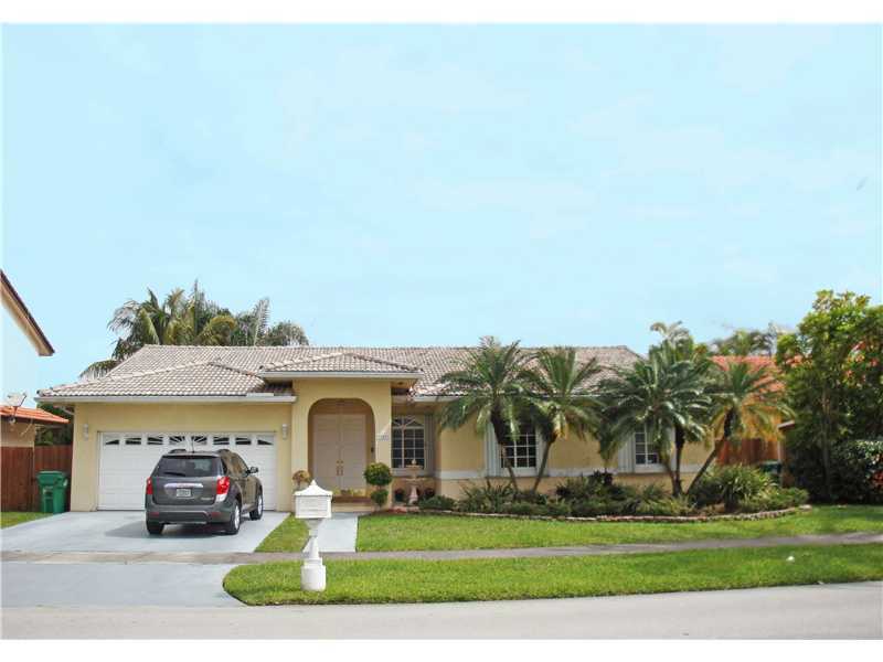 Property Photo: 405 NW 136 Ct FL 33182