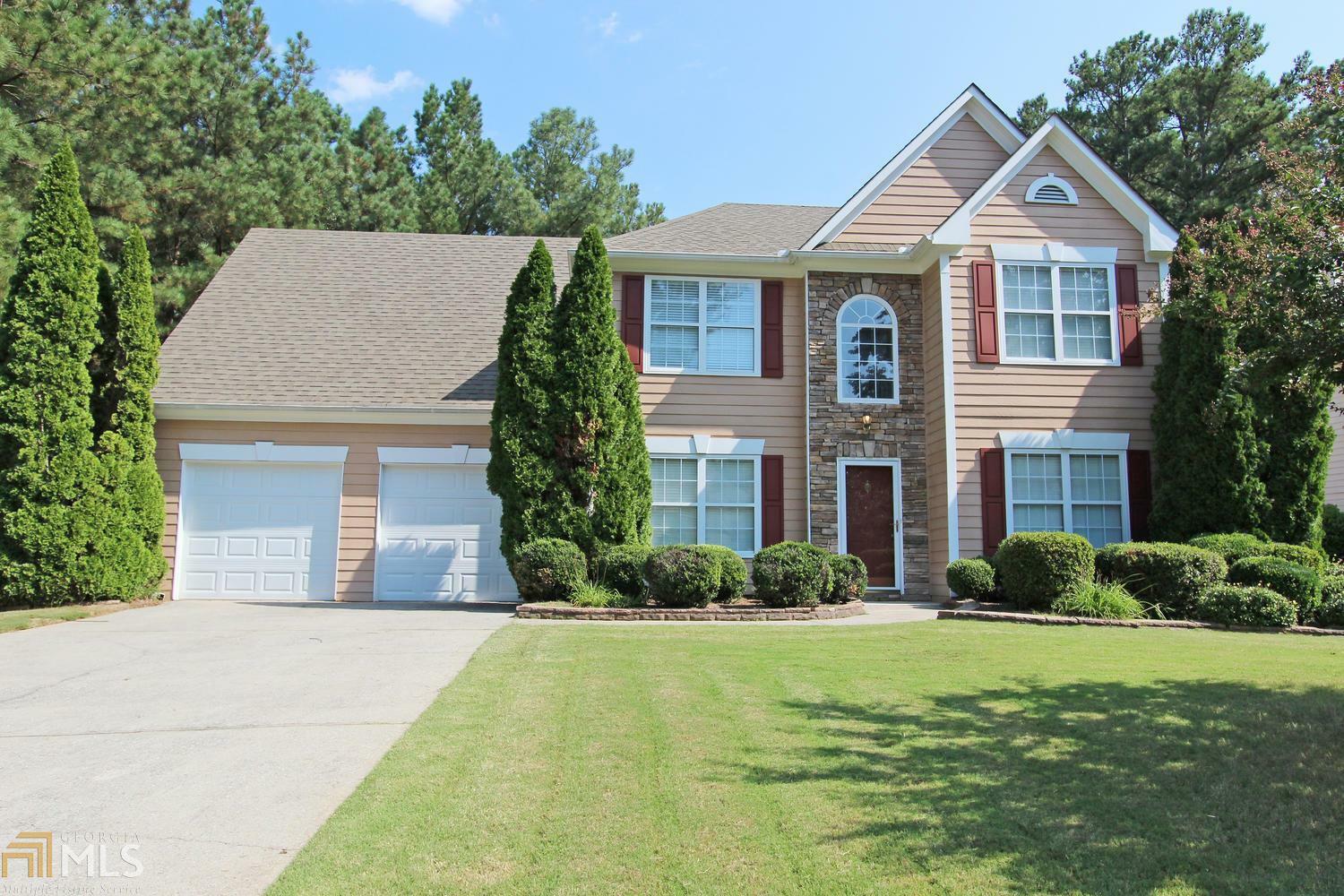 Property Photo:  1568 Woodmore Dr  GA 30008 