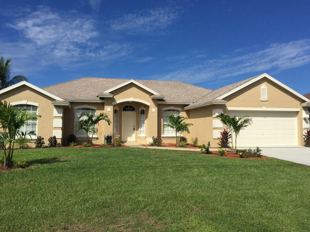 Property Photo:  2102 SW Algiers Street  FL 34953 