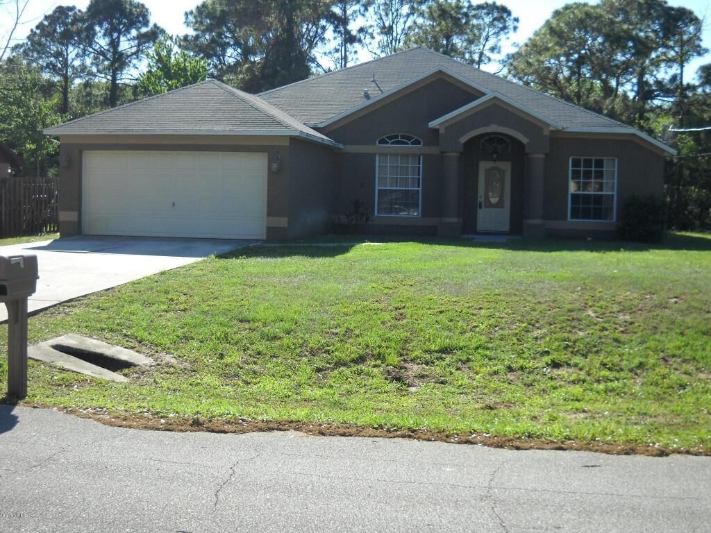 Property Photo:  6860 Caliph Avenue  FL 32927 