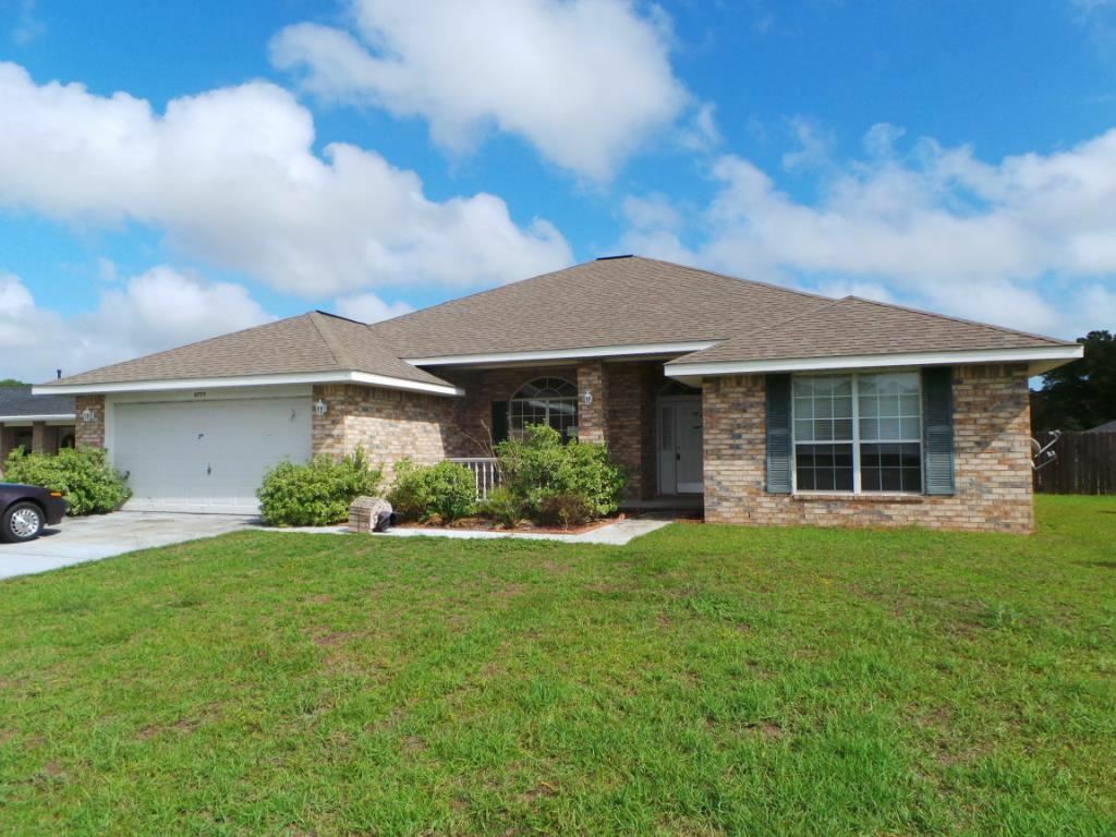 Property Photo:  8775 Kennedy Dr  FL 32506 