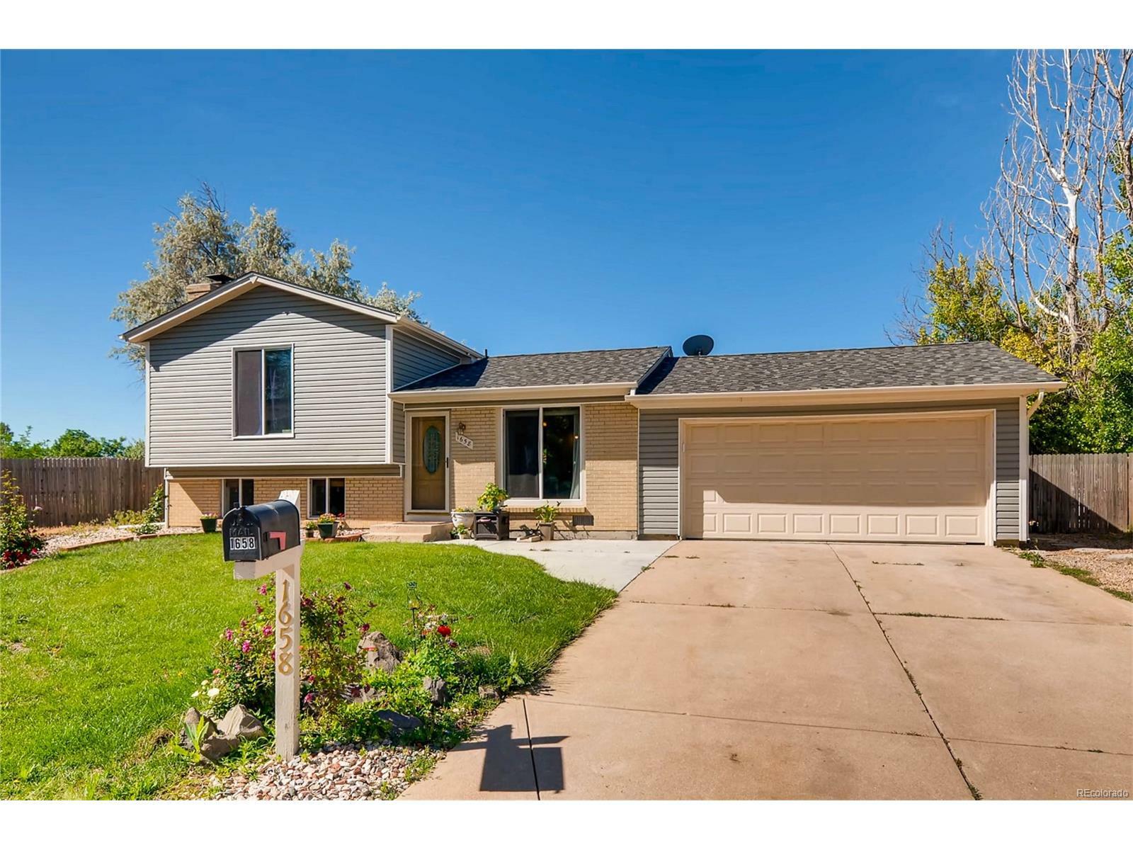 Property Photo: 1658 S Quintero Way CO 80017