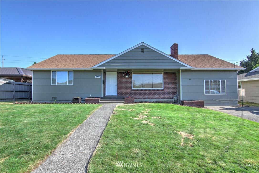 Property Photo:  1111 S 65th Street  WA 98408 