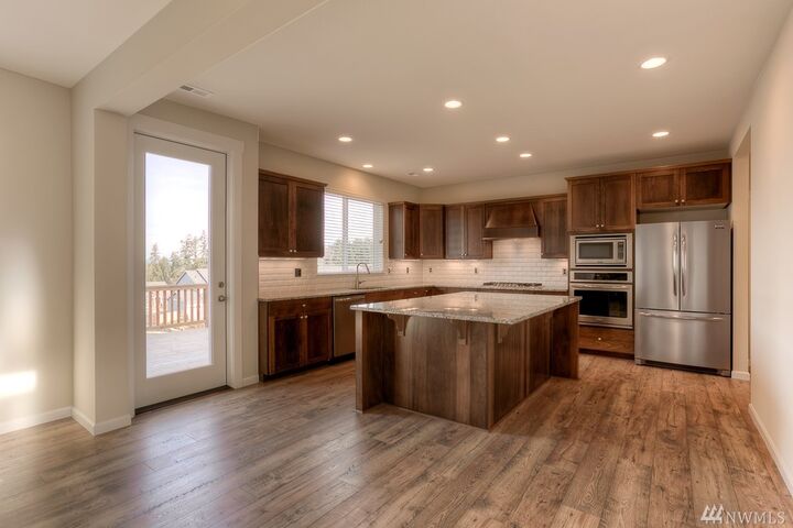 Property Photo:  323 221st Place SW L1001  WA 98021 