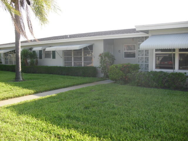 Property Photo:  570 High Point Drive C  FL 33445 