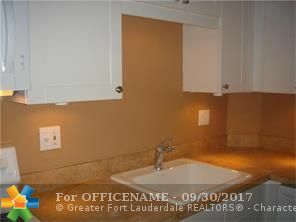 Property Photo:  1950 N Andrews Av 208  FL 33305 