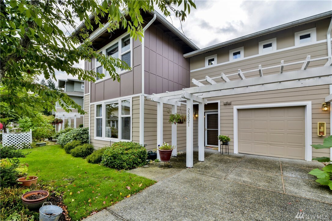 Property Photo:  22521 SE 37th Terr 1411  WA 98029 