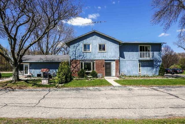 Property Photo: W1104 Miramar Rd 1D WI 53120-2184