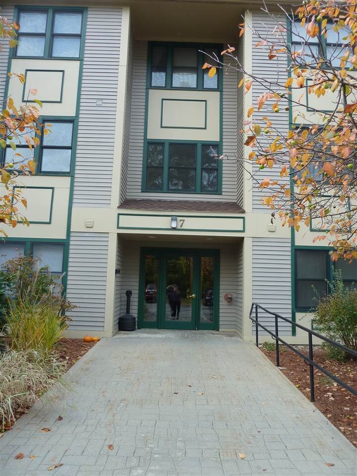 Property Photo:  7 Bartemus Trail 206  NH 03063 