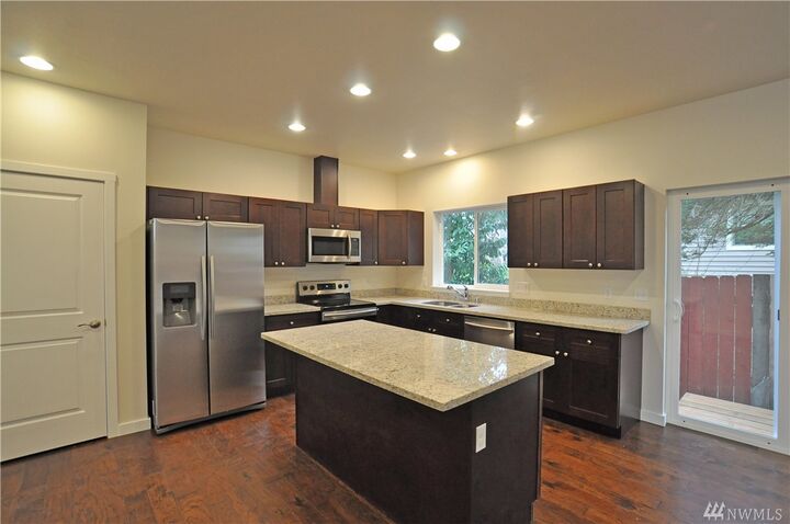 Property Photo:  203 S 68th St  WA 98408 