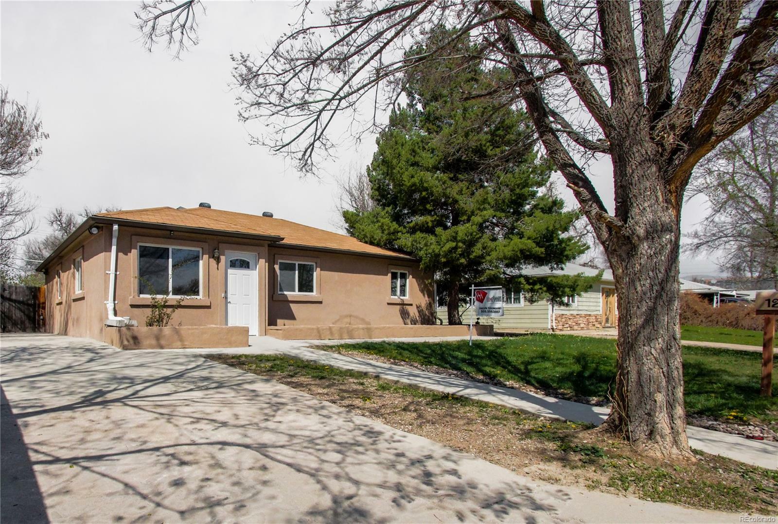 Property Photo: 1265 Xanadu Street CO 80011