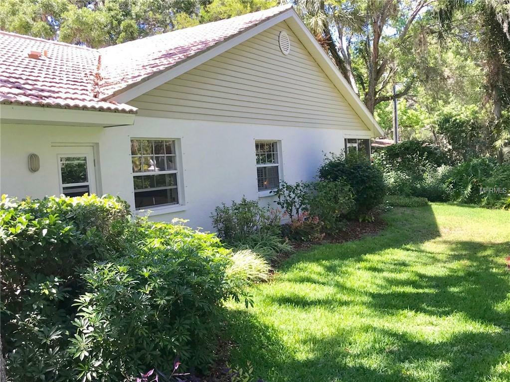 Property Photo:  7011 Woodside Oaks Circle 7  FL 34231 