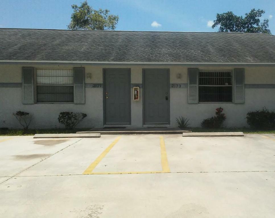 Property Photo:  2173 SE Lennard Road  FL 34952 