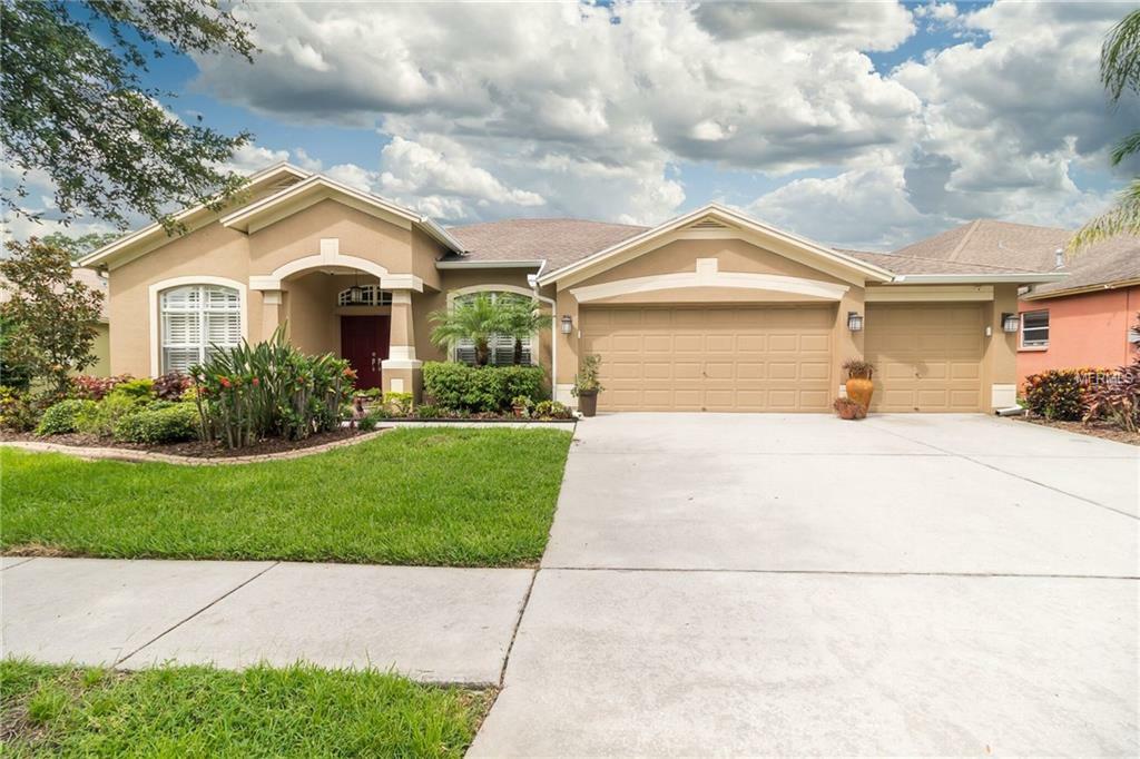 Property Photo: 7314 Carrington Oaks Lane FL 33572