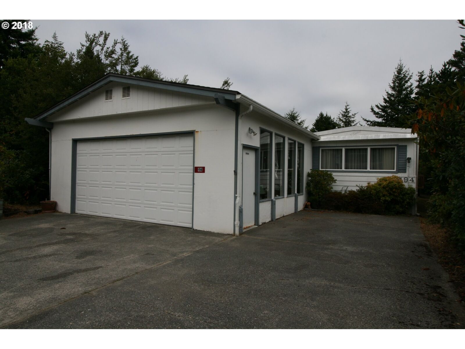 Property Photo:  1600 Rhododendron Dr Sp194  OR 97439 