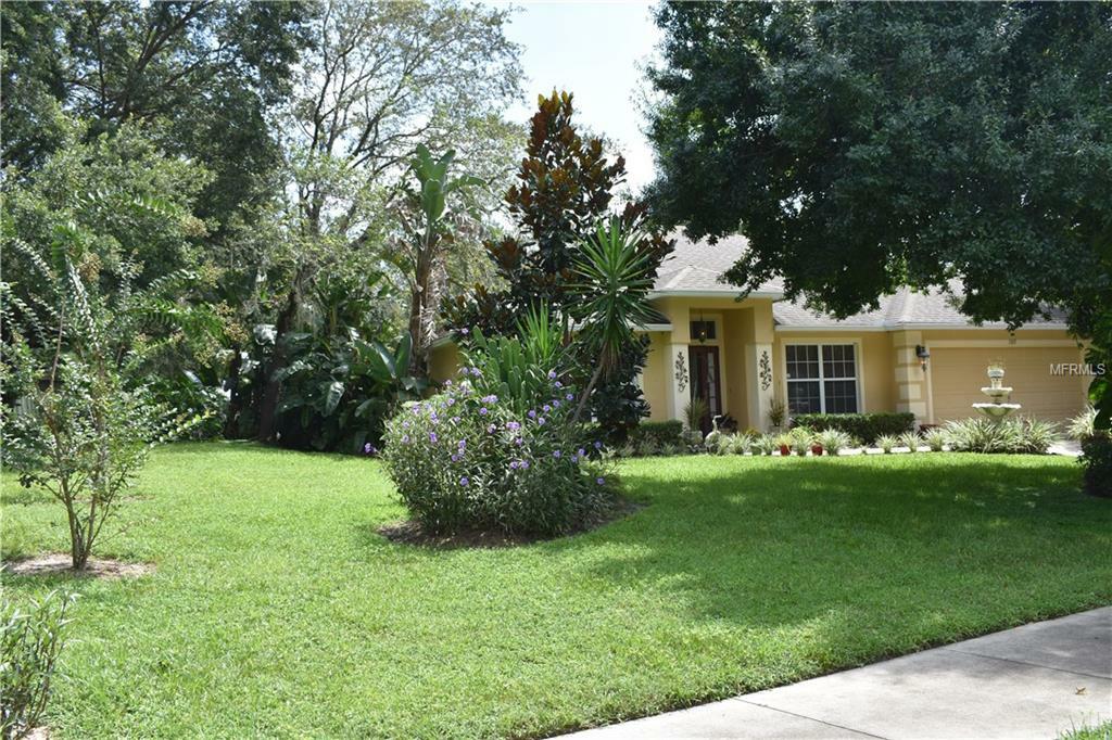 Property Photo:  1317 Canopy Oaks Drive  FL 34715 