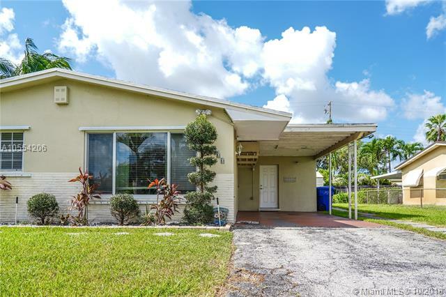 Property Photo:  900 NW 73rd Way  FL 33024 