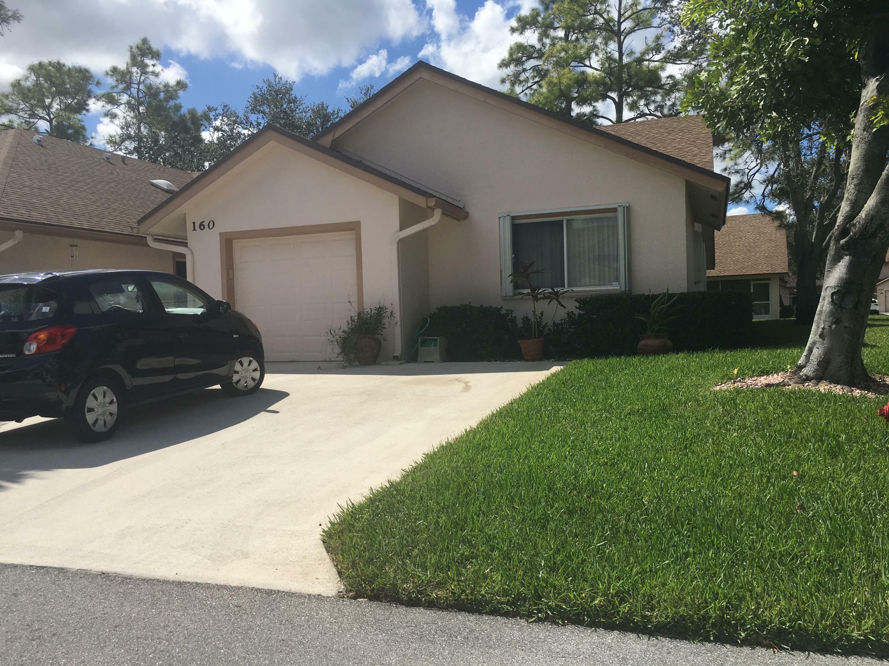 Property Photo:  160 Par Drive  FL 33411 