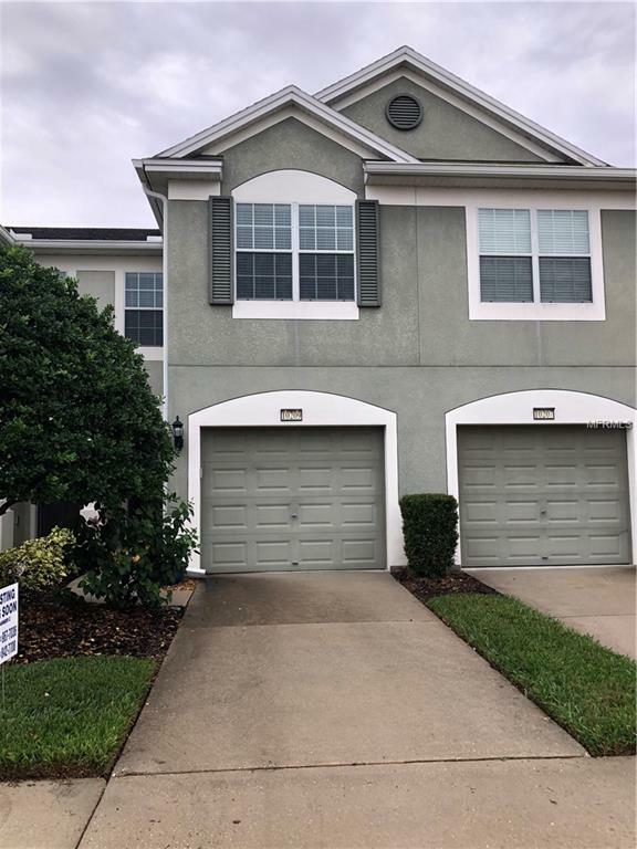 Property Photo: 10209 Red Currant Court FL 33578