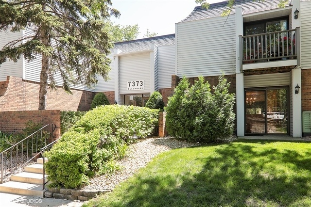 Property Photo:  7373 Blackburn Avenue J-202  IL 60516 