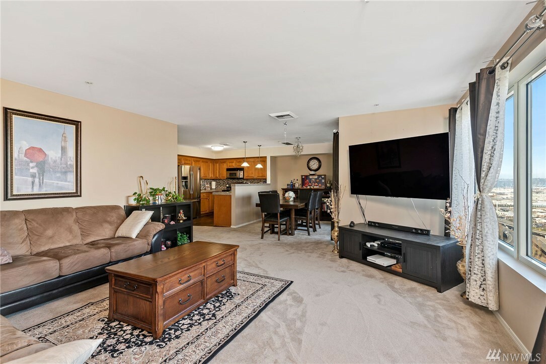 Property Photo:  3201 Pacific Ave 1106  WA 98418 