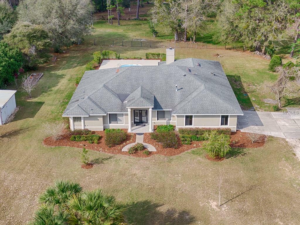 Property Photo:  21411 Rollingwood Trail  FL 32736 