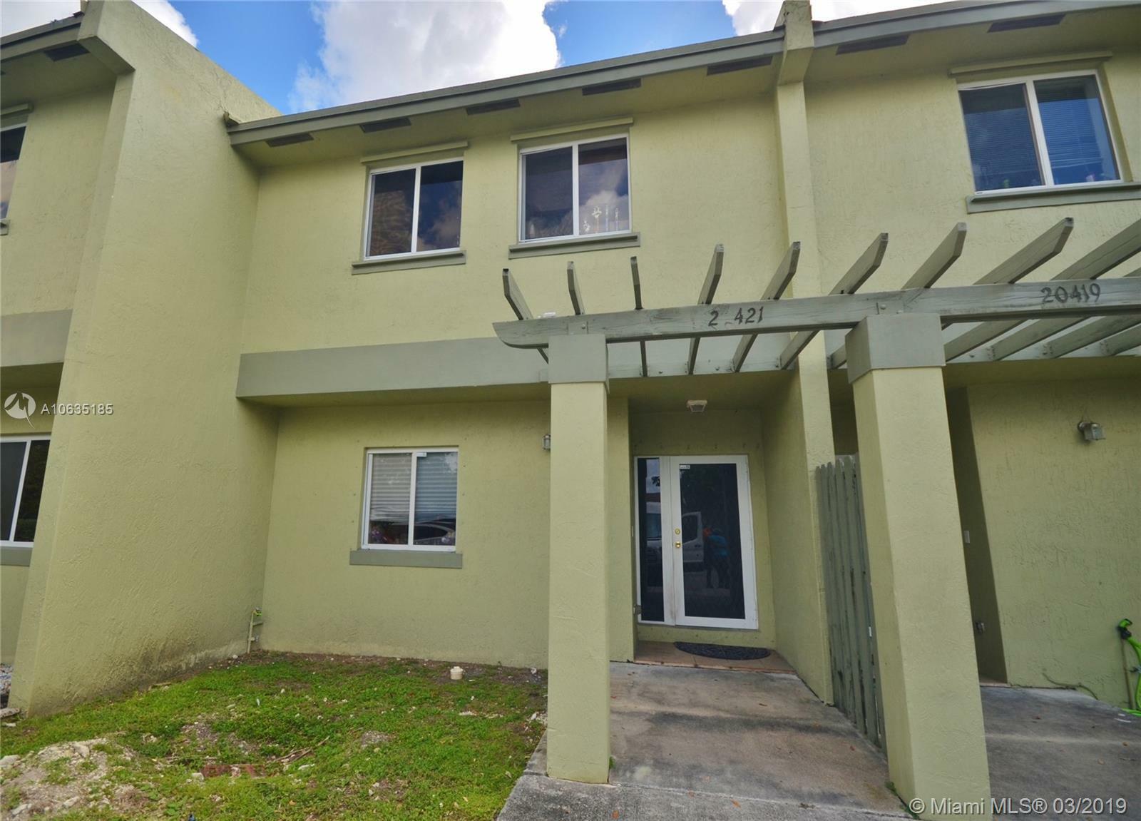 Property Photo:  20421 NW 15th Ave 8  FL 33169 