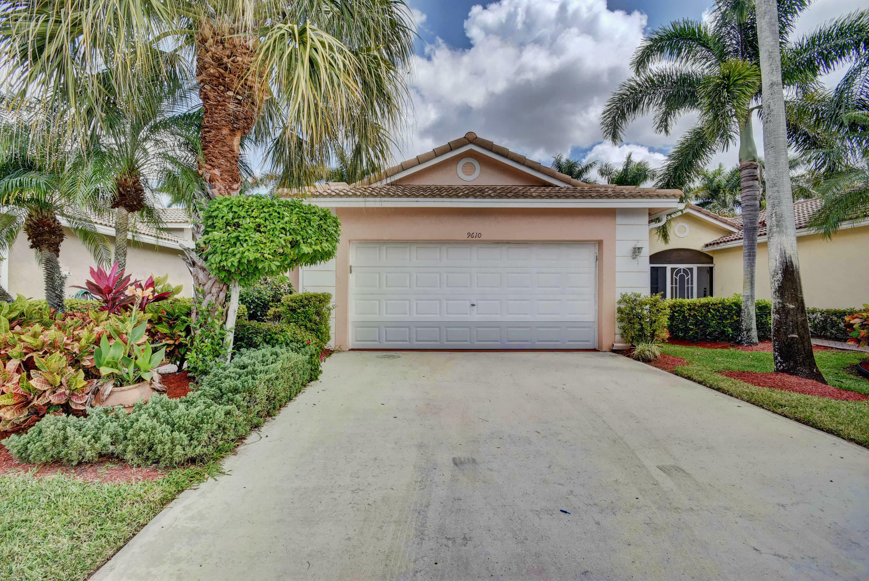 Property Photo:  9610 Cherry Blossom Court  FL 33437 