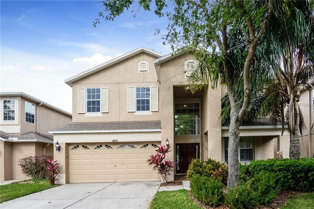 Property Photo:  5913 Tulip Flower Drive  FL 33578 