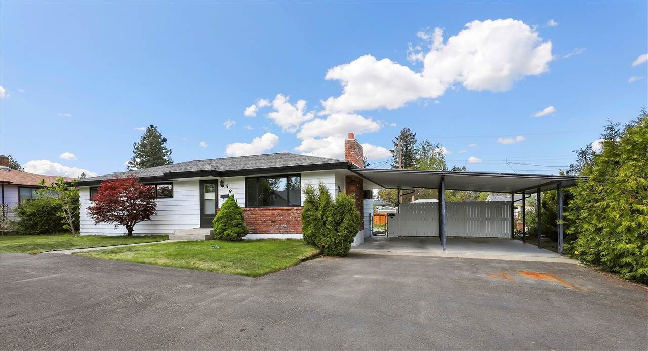 Property Photo:  5911 N Washington St  WA 99205 