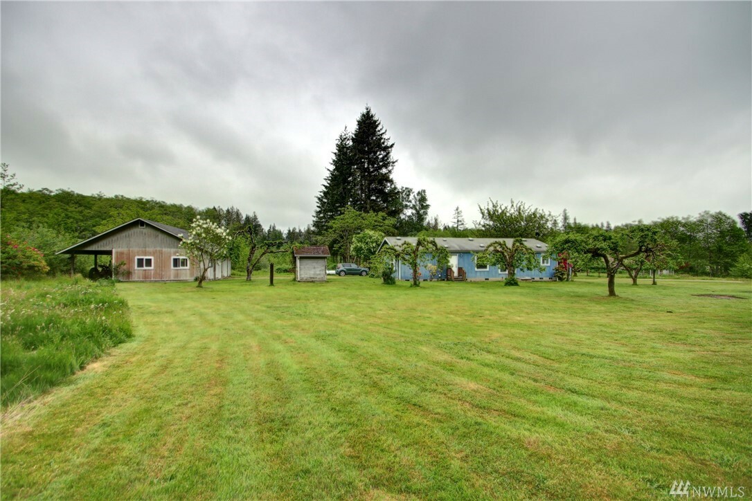 Property Photo:  915 288th St NE  WA 98292 