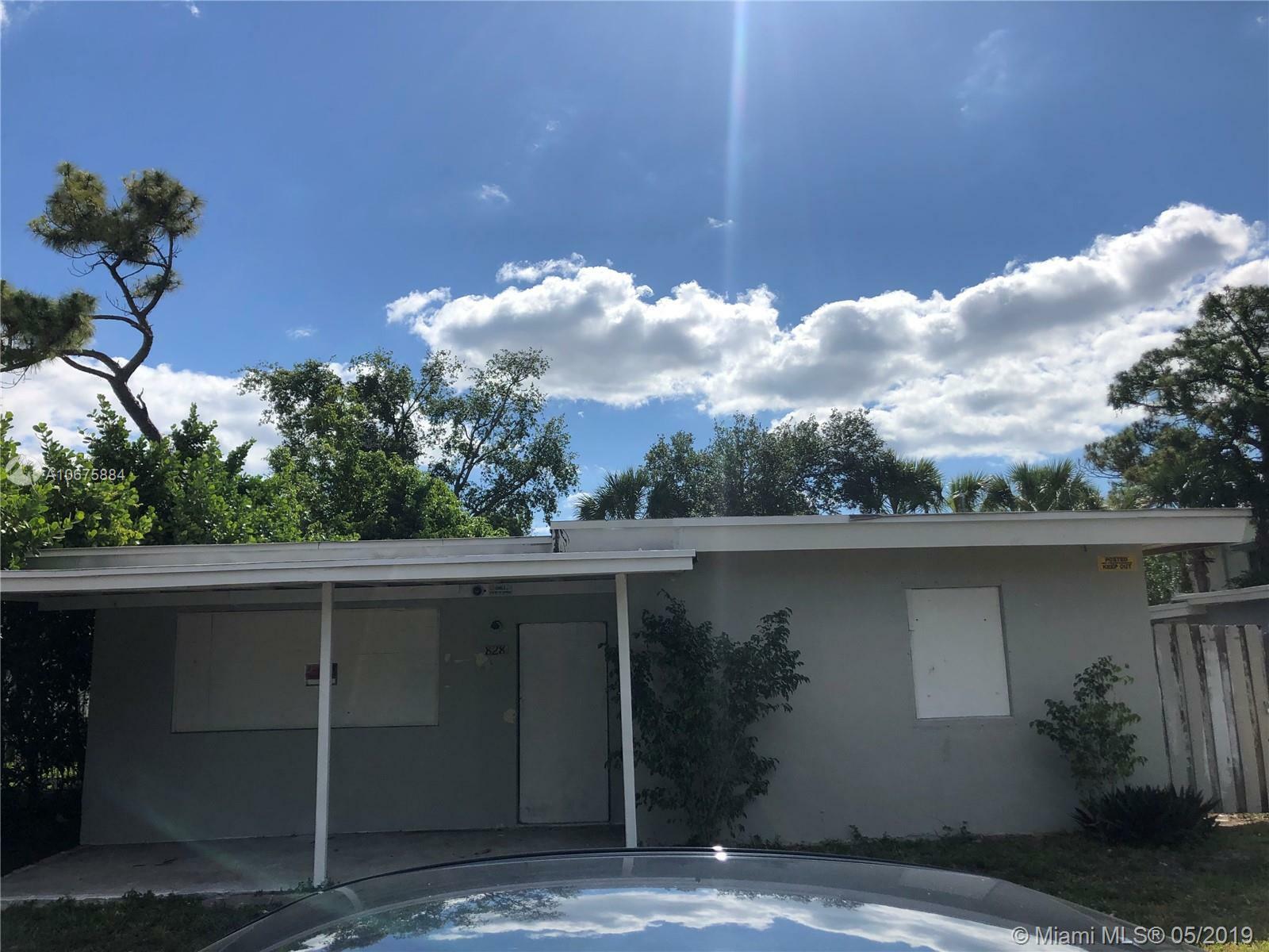 Property Photo:  828 NW 14th Way  FL 33311 