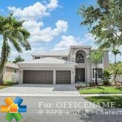 Property Photo:  1003 NW 139 Ter  FL 33028 