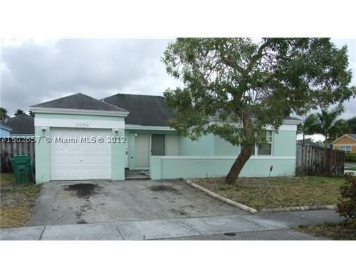 Property Photo:  3498 NW 200 Te  FL 33056 