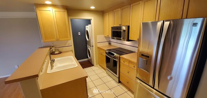 Property Photo:  15345 Sunwood Boulevard D202  WA 98188 