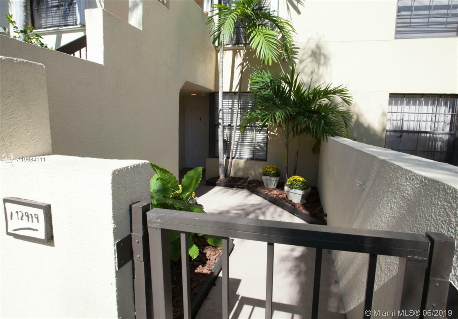 Property Photo:  12919 SW 88th Ter C-103  FL 33186 