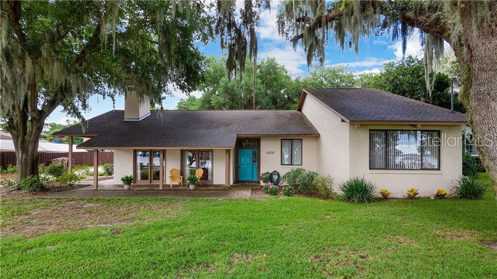 Property Photo:  16328 Lakeshore Drive  FL 34715 