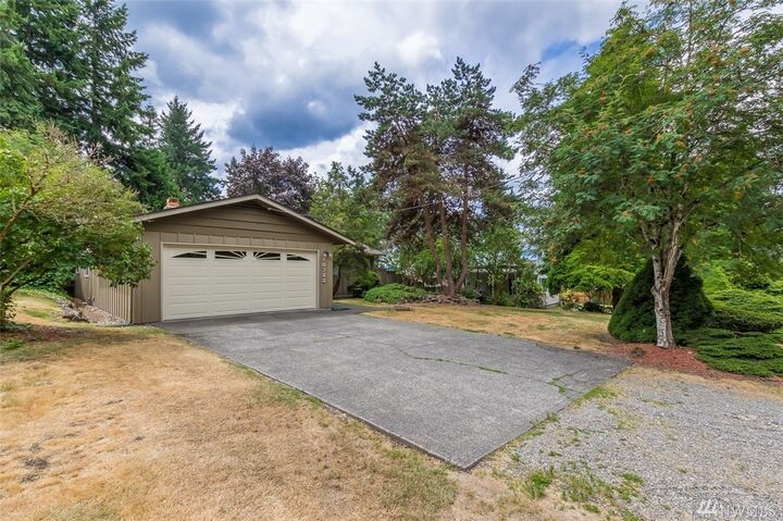 Property Photo:  10722 48th St E  WA 98372 