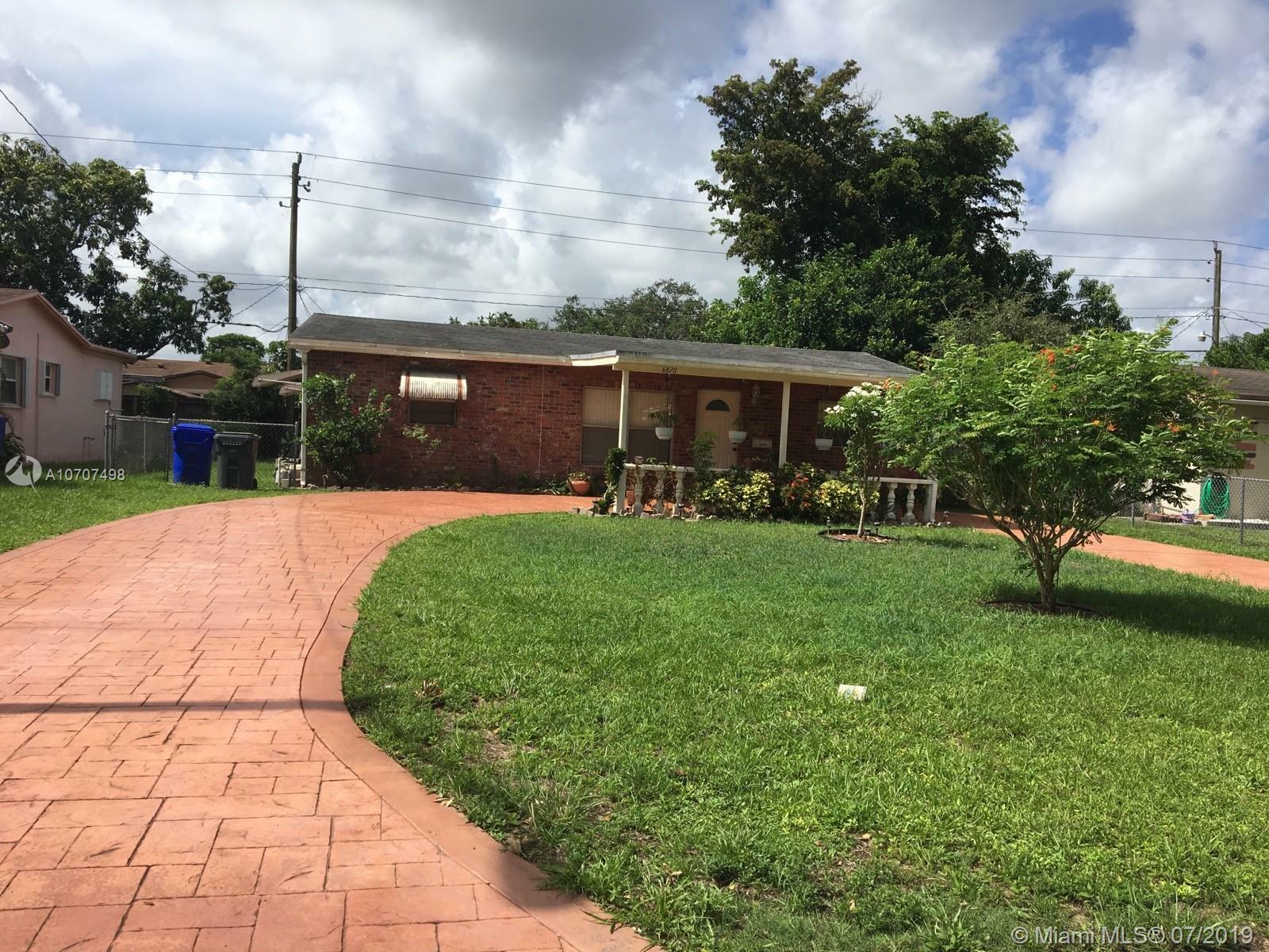 Property Photo:  6870 Thomas St  FL 33024 